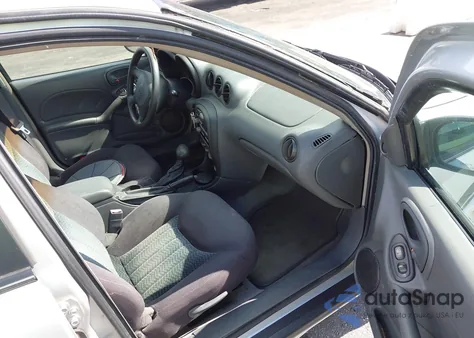 2004 Pontiac Grand Am z USA, uszkodzony, nr VIN 1G2NE52FX3C323453